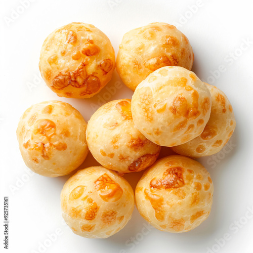 a pile of cheese balls on a white surface photo