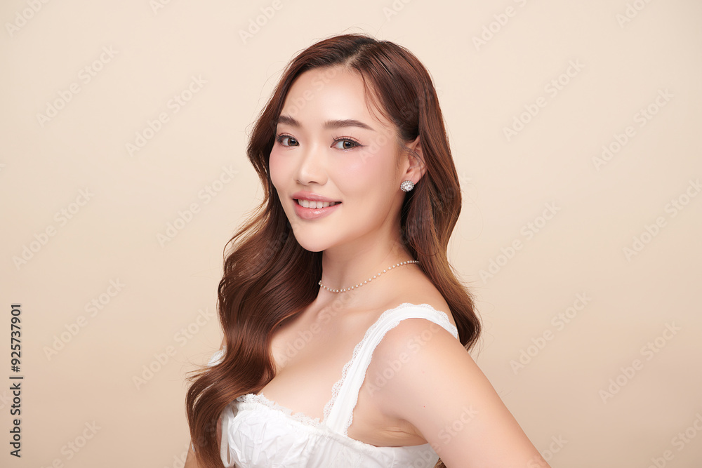 Beautiful young asian woman with clean fresh skin on beige background, Face care, Facial treatment, Cosmetology, beauty and spa, Asian women portrait. Beautiful young asian woman with clean fresh skin on beige background, Face care, Facial treatment, Cosmetology, beauty and spa, Asian women portrait.