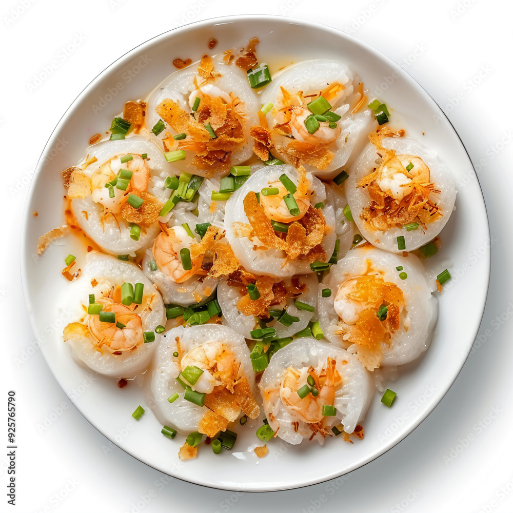 a white plate topped with scallops covered in cheese a white plate topped with scallops covered in cheese
