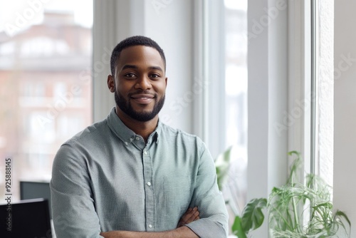 Latino Business Owner. Portrait of a Young Man in Office Working as Programmer and Developer