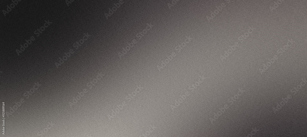 Abstract background with a fading light source on a textured dark gray backdrop Abstract background with a fading light source on a textured dark gray backdrop