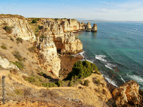 Algarve Portugal. The most beautiful sea coast in southern Europe, beautiful sea and fantastic wild rock formations photo