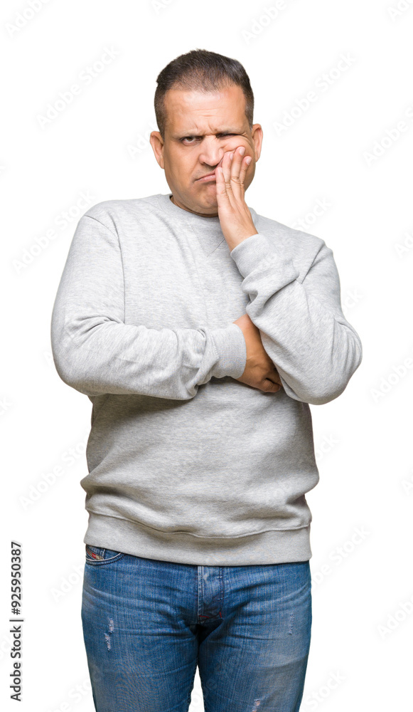 Middle age arab man wearing sport sweatshirt over isolated background thinking looking tired and bored with depression problems with crossed arms. Middle age arab man wearing sport sweatshirt over isolated background thinking looking tired and bored with depression problems with crossed arms.