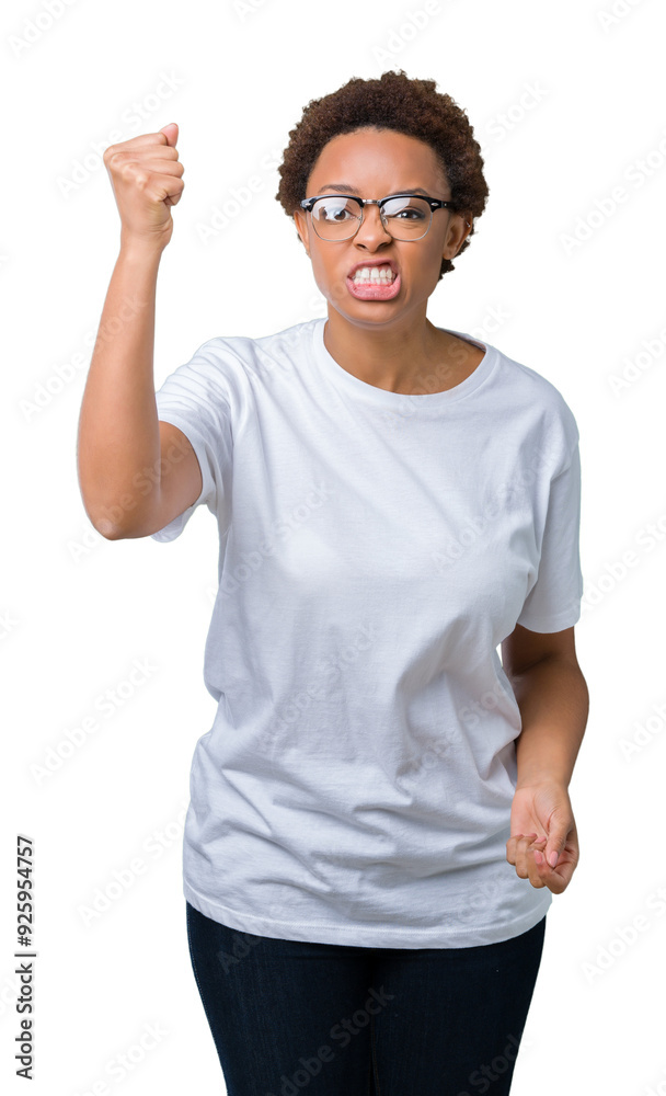 Beautiful young african american woman wearing glasses over isolated background angry and mad raising fist frustrated and furious while shouting with anger. Rage and aggressive concept. Beautiful young african american woman wearing glasses over isolated background angry and mad raising fist frustrated and furious while shouting with anger. Rage and aggressive concept.