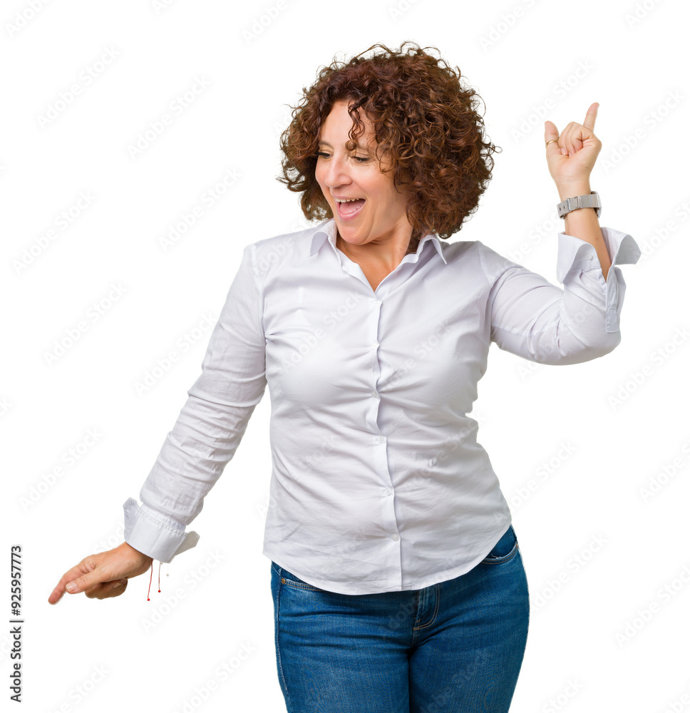 Beautiful middle ager senior businees woman over isolated background Dancing happy and cheerful, smiling moving casual and confident listening to music