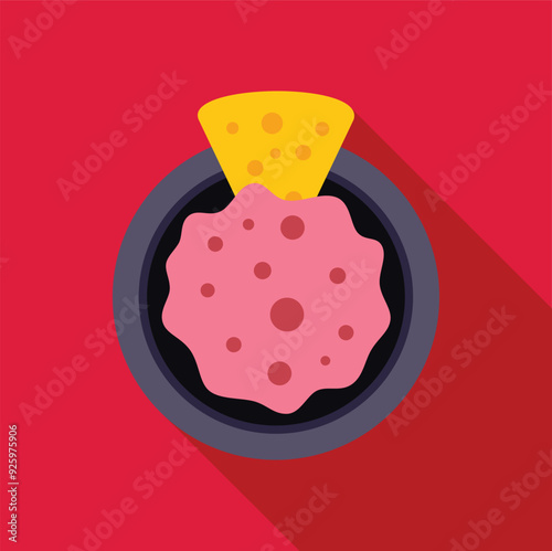 Bowl of pink dipping sauce with a tortilla chip dipped in it