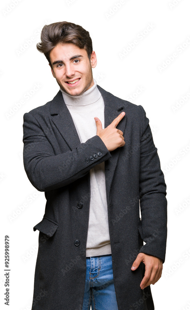 Young elegant man wearing winter coat over isolated background cheerful with a smile of face pointing with hand and finger up to the side with happy and natural expression on face Young elegant man wearing winter coat over isolated background cheerful with a smile of face pointing with hand and finger up to the side with happy and natural expression on face