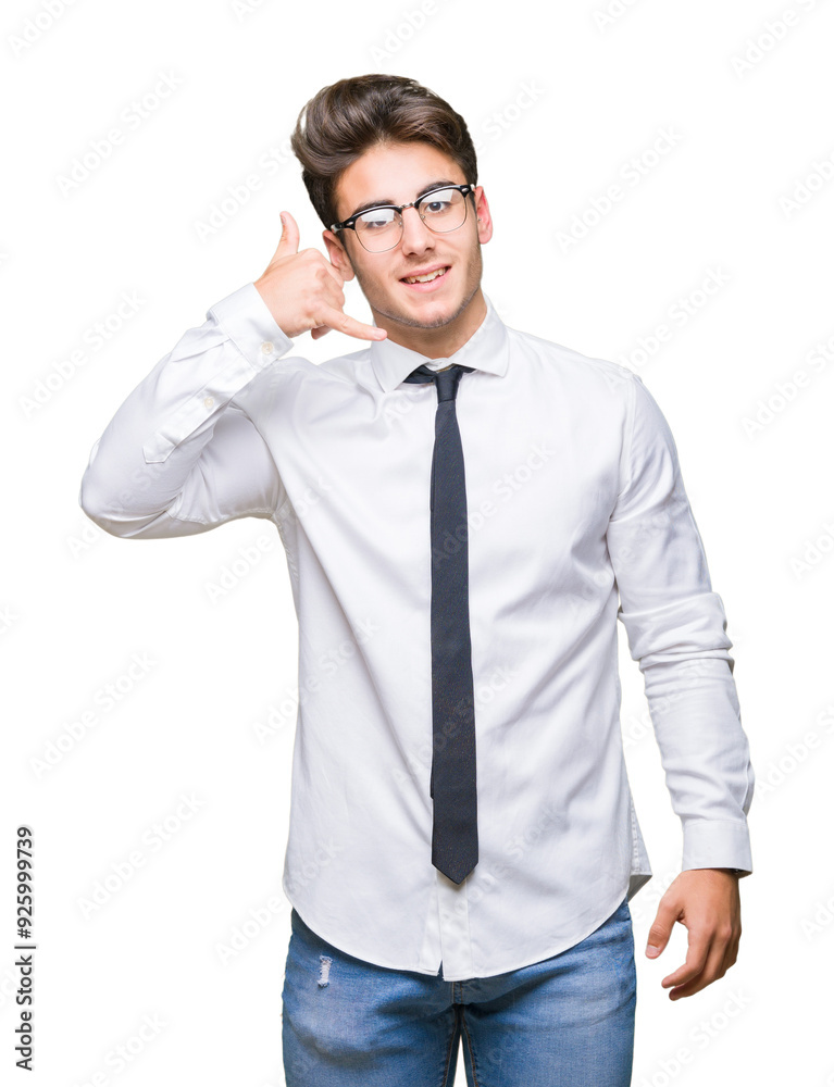 Young business man wearing glasses over isolated background smiling doing phone gesture with hand and fingers like talking on the telephone. Communicating concepts. Young business man wearing glasses over isolated background smiling doing phone gesture with hand and fingers like talking on the telephone. Communicating concepts.