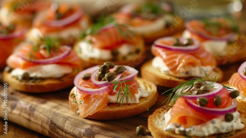 Gourmet Bagels with Smoked Salmon and Cream Cheese on Rustic Wood