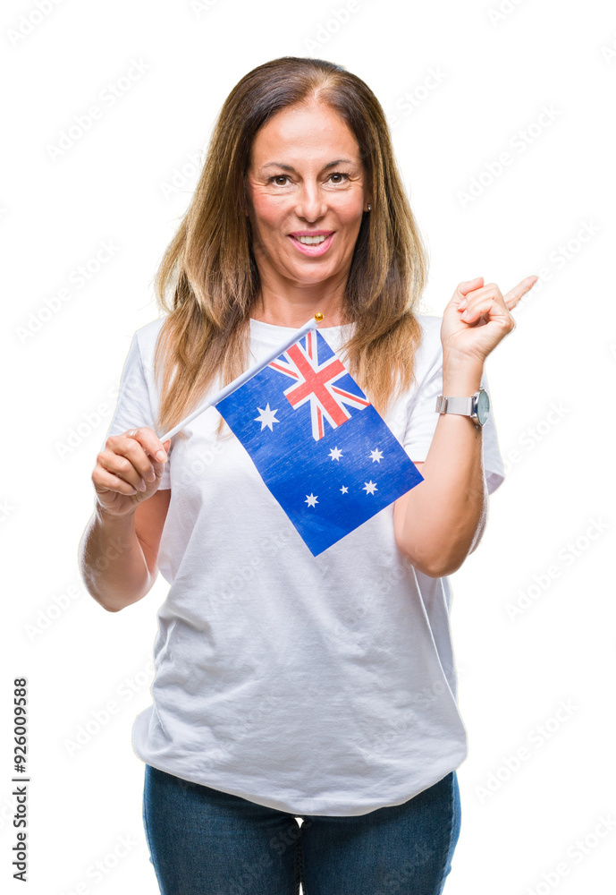 Middle age hispanic woman holding flag of Australia over isolated background very happy pointing with hand and finger to the side Middle age hispanic woman holding flag of Australia over isolated background very happy pointing with hand and finger to the side