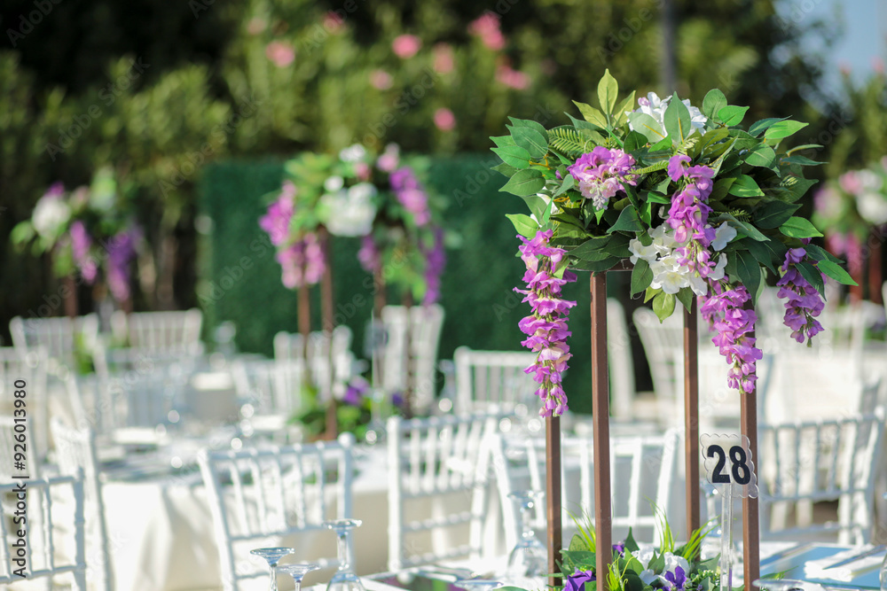 Elegant Outdoor Wedding Reception with Wisteria Floral Centerpieces