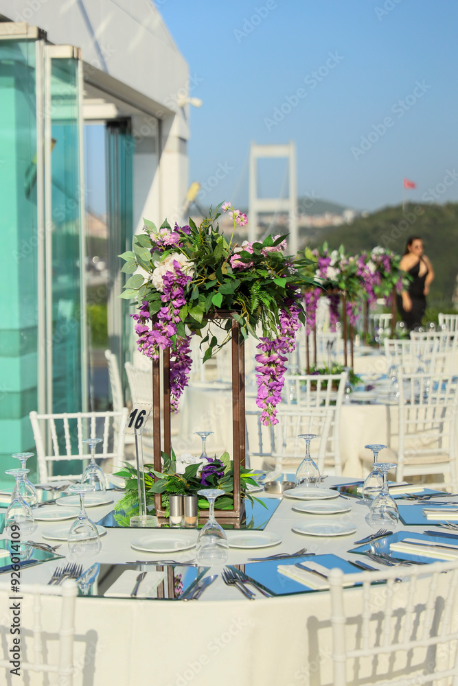 Elegant Outdoor Wedding Reception with Wisteria Floral Centerpieces