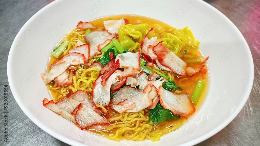 Thai food: Pork wonton soup in a white container Thai food: Pork wonton soup in a white container