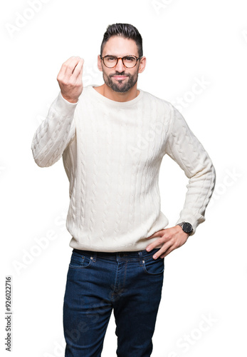 Young handsome man wearing glasses over isolated background Doing Italian gesture with hand and fingers confident expression