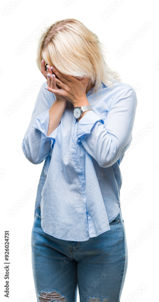 Young beautiful blonde business woman wearing glasses over isolated background with sad expression covering face with hands while crying. Depression concept. Young beautiful blonde business woman wearing glasses over isolated background with sad expression covering face with hands while crying. Depression concept.