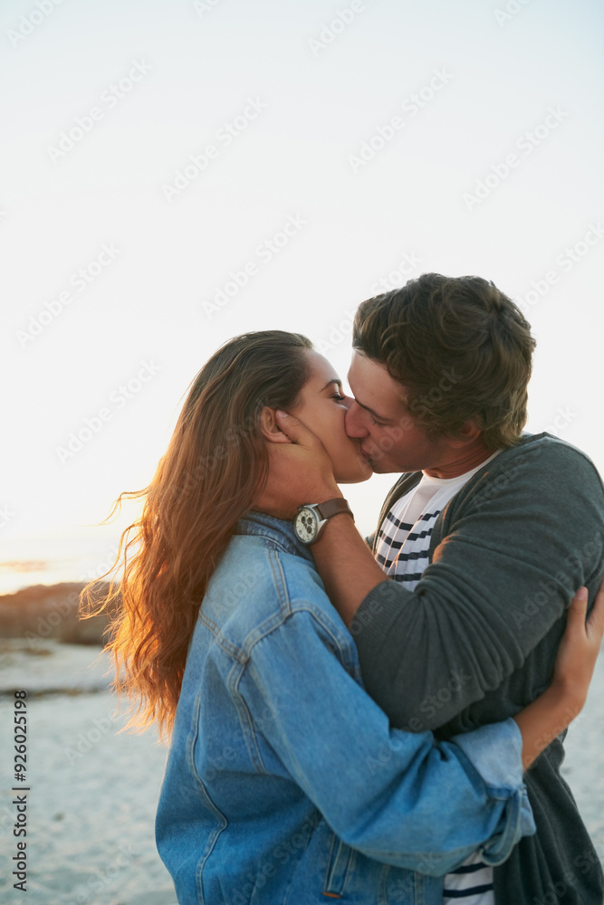 Beach, kiss and couple with love, relationship and happiness with anniversary, vacation and moment. Seaside, hug and man with woman, marriage and getaway trip for honeymoon, nature and summer holiday Beach, kiss and couple with love, relationship and happiness with anniversary, vacation and moment. Seaside, hug and man with woman, marriage and getaway trip for honeymoon, nature and summer holiday