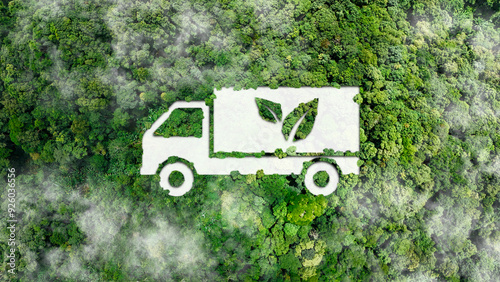 Green logistic or Sustainable transport concept. Truck icon transport logistics travel with clean energy, eco friendly process on forest background to Net zero carbon emission photo