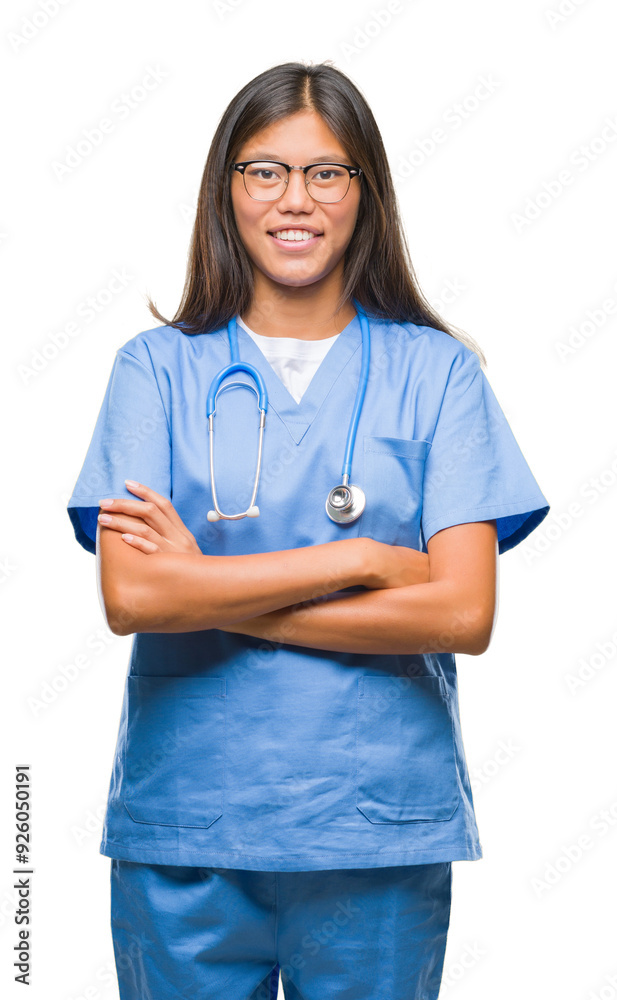 Young asian doctor woman over isolated background happy face smiling with crossed arms looking at the camera. Positive person. Young asian doctor woman over isolated background happy face smiling with crossed arms looking at the camera. Positive person.