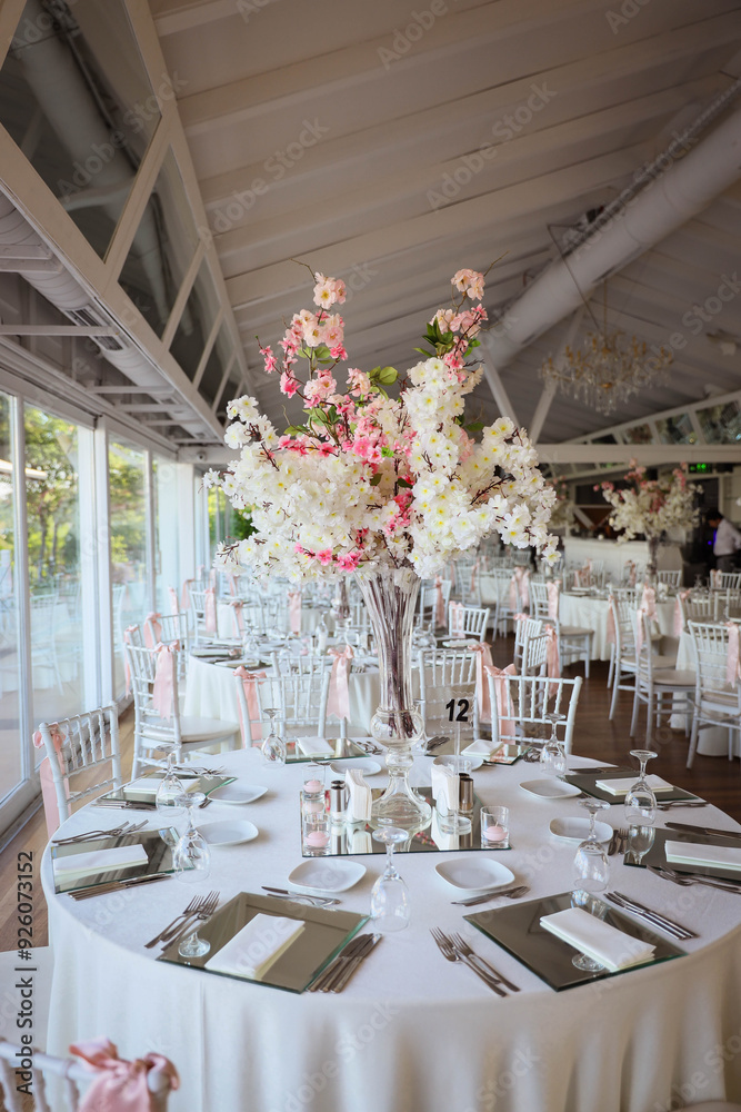 Indoor Wedding Reception: Round Table with White Flowers and Crystal Accents