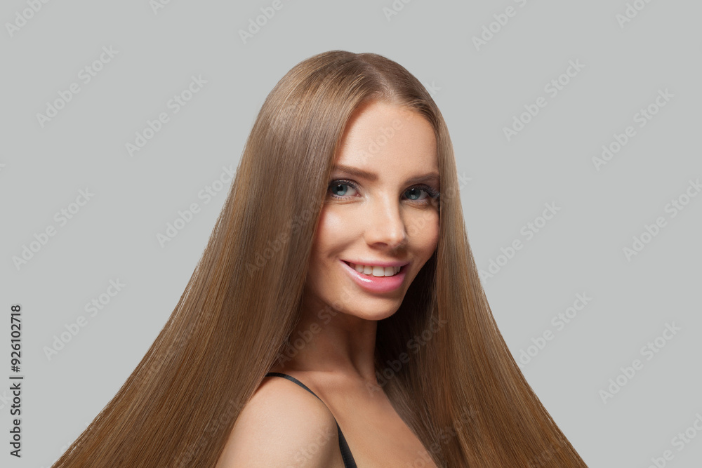 Fashion portrait of female model brunette with long hair and natural make-up posing isolated on white background Fashion portrait of female model brunette with long hair and natural make-up posing isolated on white background