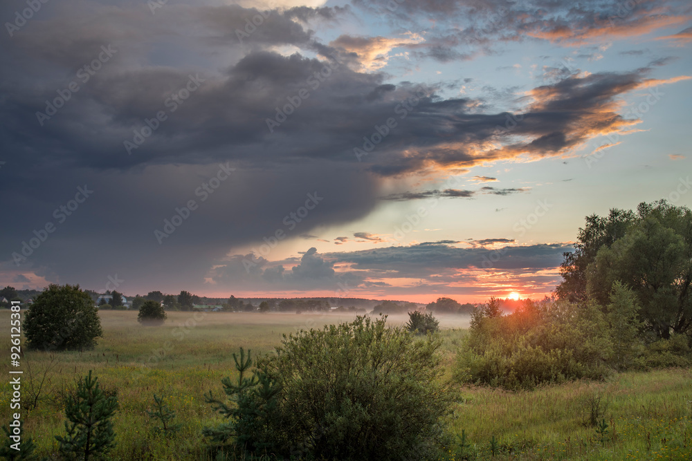 A cloudy sky with a large cloud in the middle A cloudy sky with a large cloud in the middle