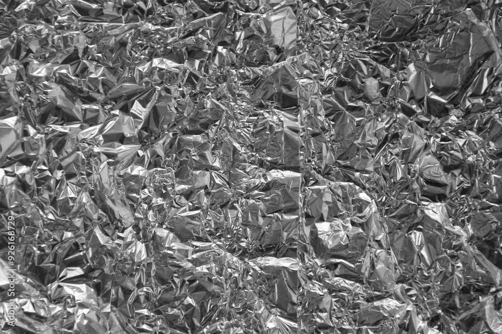 Processed collage of shiny metal silver gray foil crumpled packaging material texture Processed collage of shiny metal silver gray foil crumpled packaging material texture
