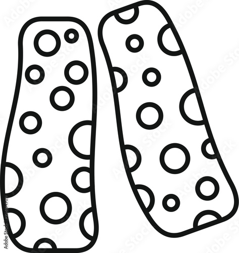 Pair of leg warmers with polka dot pattern representing eighties fashion style