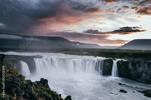 Traveling though Iceland and discovering beautiful waterfall, here the Godafoss in the golden hour with perfect lighting conditions