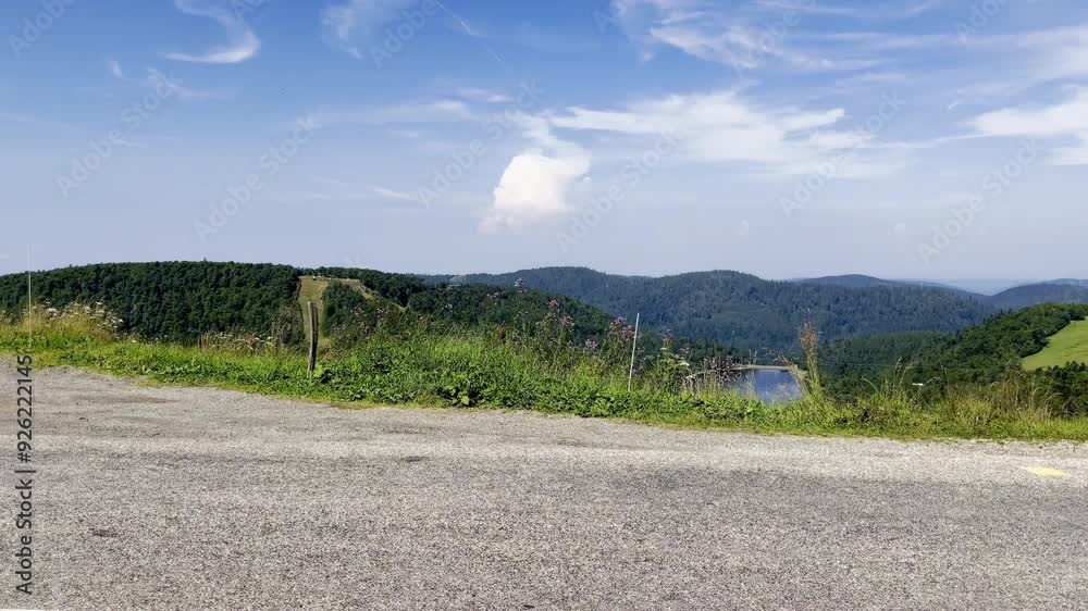 Panoramic Summer View of Lac de la Lande and Grand Artimont from Route des Crêtes in La Bresse, Vosges: Scenic Landscape with Alpine Lake, Meadows, and Vologne Express Chairlift, Grand Est, France
