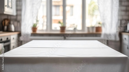 Elegant White Tablecloth on Kitchen Table with Space for Design