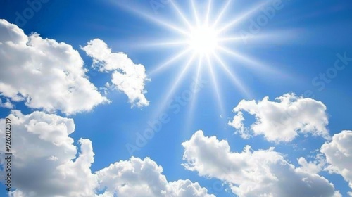 Blue Sky, white clouds and shining sun. Beautiful sunny day background for any outdoor activities.