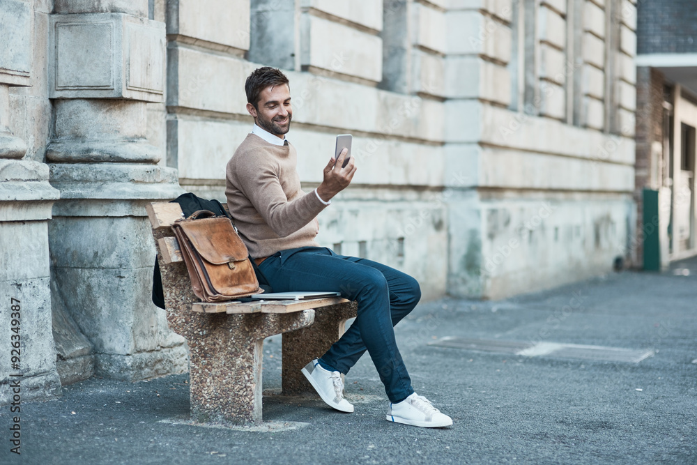 Businessman, sidewalk and smile with smartphone on bench with mobile app for ehailing cab in New York. Male person, employee and happy with networking, communication and connection on social media Businessman, sidewalk and smile with smartphone on bench with mobile app for ehailing cab in New York. Male person, employee and happy with networking, communication and connection on social media