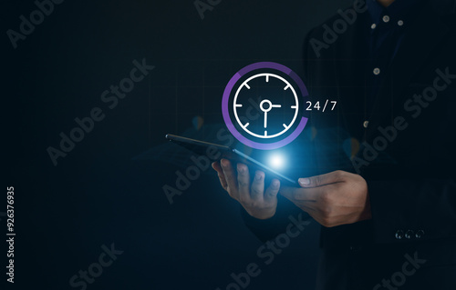  hand holding virtual 24-7 with clock on hand for worldwide nonstop and full-time available contact of service concept. customer service, nonstop service concept.