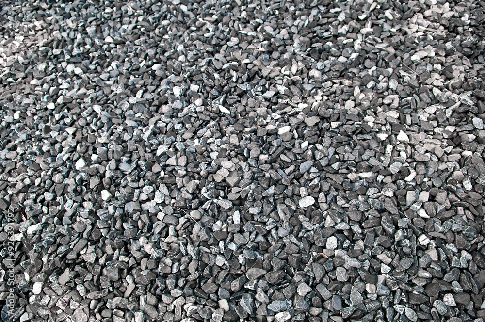 Pattern grey gravel granite texture background for mix rock concrete pattern in construction industrial. Small gray pebble on ground or floor. Vintage and retro. Close up. Pattern grey gravel granite texture background for mix rock concrete pattern in construction industrial. Small gray pebble on ground or floor. Vintage and retro. Close up.
