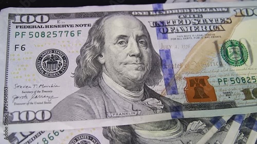 Dollars, American banknotes value of 100, rotate. Close-Up of banknotes. Hundred dollar bill close up in camera motion. Dollars money. 100 dollars Us