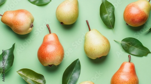 Close up pears and leaves on a green background. Pear fruit texture