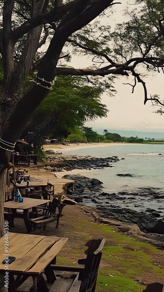 Fototapeta premium Ocean View with Palm Trees and Wooden Tables