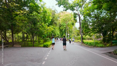 Wallpaper Mural path for all walks of life in city park at Vachirabenjatas Park (Rot Fai Park) Bangkok, Thailand ,It is one of the most popular parks in Bangkok. Torontodigital.ca