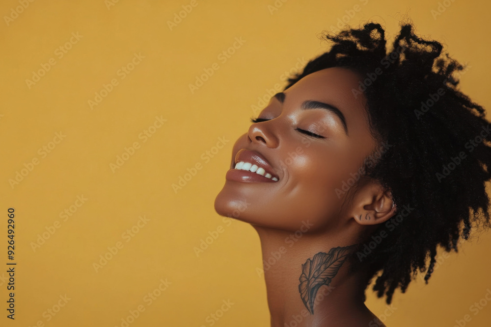 A close up of a tattooed black woman's face with her eyes closed A close up of a tattooed black woman's face with her eyes closed