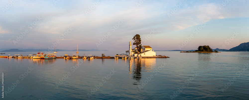 Evening view of Holy Monastery of Panagia Vlacherna and Mouse Island on the island of Corfu