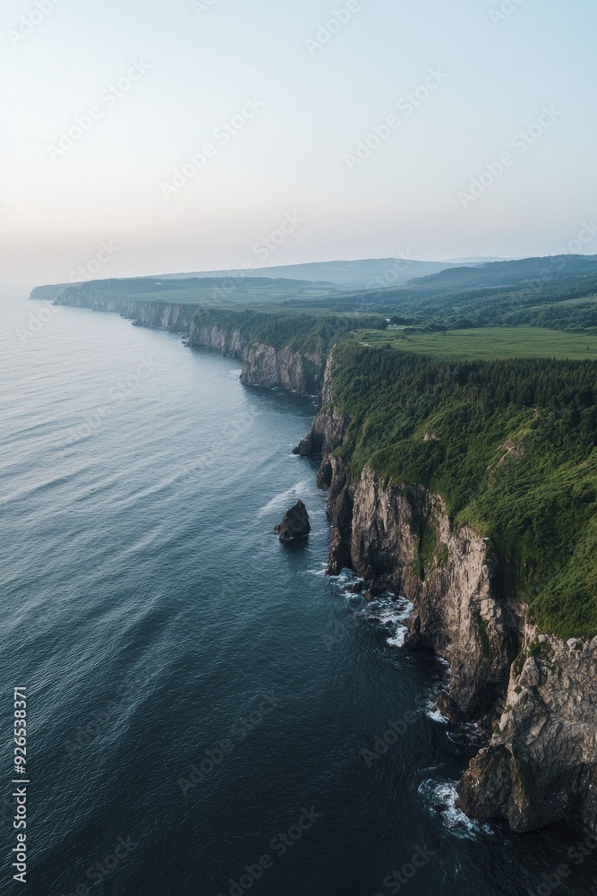 Aerial photography captures the stunning cliffs that rise sharply against the vast, open expanse of the Pacific Ocean, creating a breathtaking scene that stretches towards infinity. Aerial photography captures the stunning cliffs that rise sharply against the vast, open expanse of the Pacific Ocean, creating a breathtaking scene that stretches towards infinity.