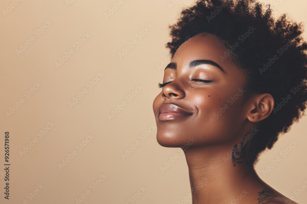 A close up of a tattooed black woman's face with her eyes closed A close up of a tattooed black woman's face with her eyes closed