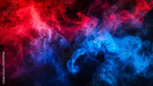 A captivating image of abstract smoke, showcasing vibrant red and blue colors swirling and blending against a dark background. The dynamic forms and ethereal nature of the smoke evoke a sense of myste