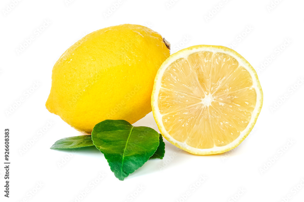 Lemon with leaves close up on white background.