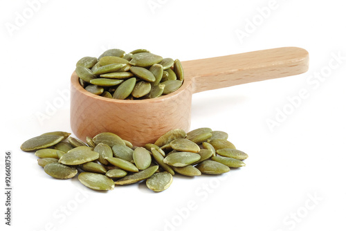 Obraz na płótnie Pumpkin seeds close up on white background. w salonie