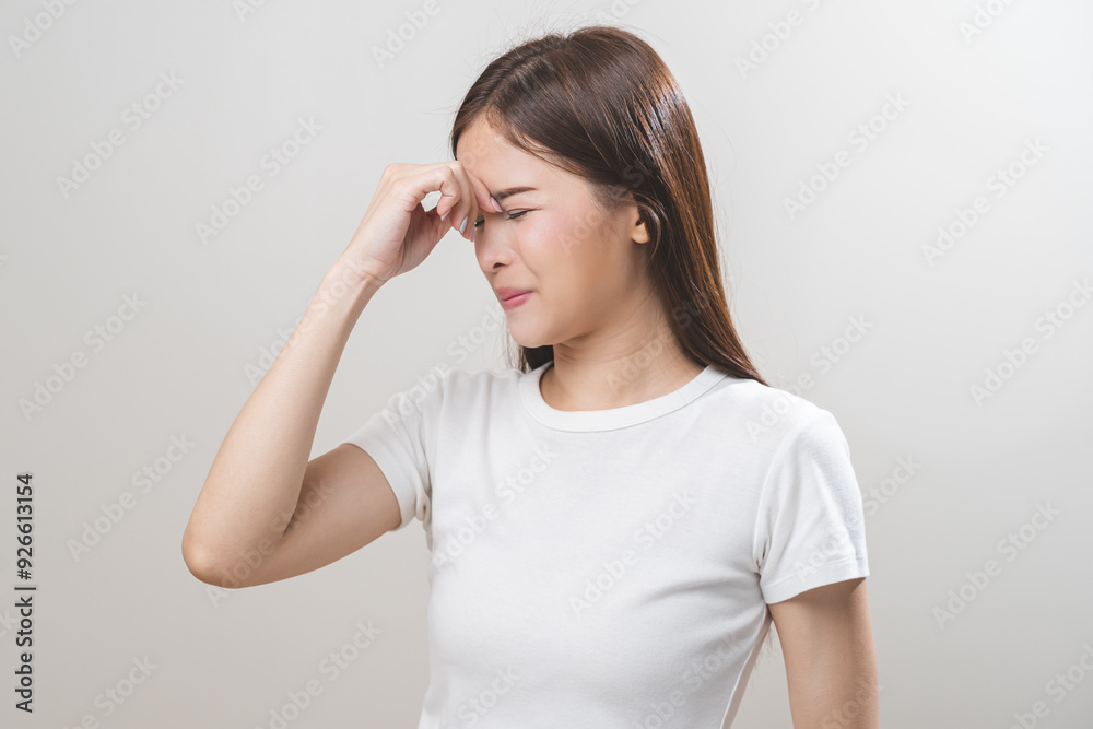 Dizzy asian young woman, girl headache or migraine pain suffering from vertigo or sick, holding head with hand, health problem of brain or inner ear not balance, standing isolated on white background. Dizzy asian young woman, girl headache or migraine pain suffering from vertigo or sick, holding head with hand, health problem of brain or inner ear not balance, standing isolated on white background.