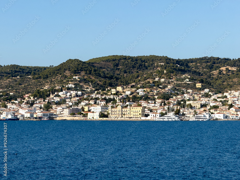 Spetses island, Greece. Seafront buildings view from the sea Spetses island, Greece. Seafront buildings view from the sea