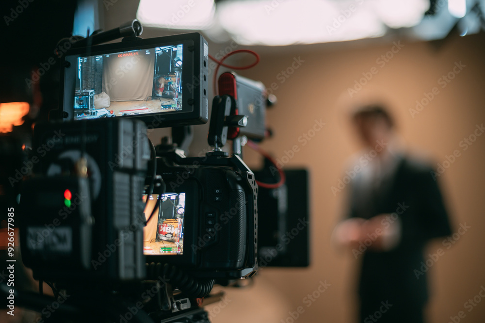 Professional cinema and video camera on the set. Shooting shift, lighting fixtures, shooting equipment and the team. Professional cinema and video camera on the set. Shooting shift, lighting fixtures, shooting equipment and the team.