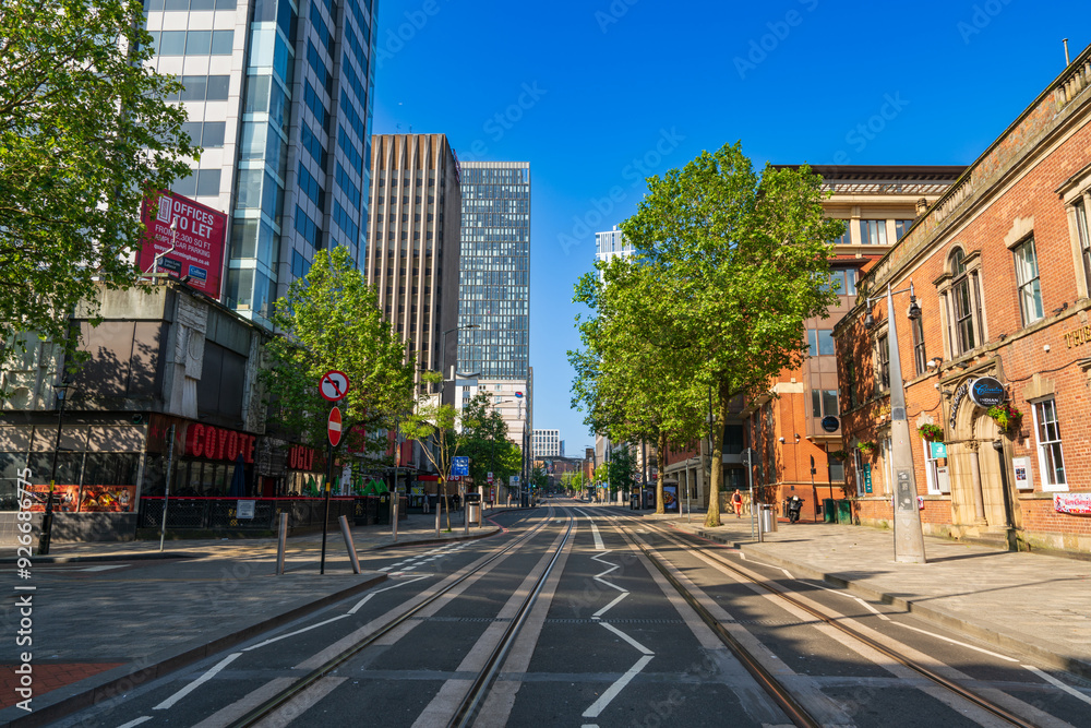 Broad street with tram tracks at downtown of Birmingham city. England Broad street with tram tracks at downtown of Birmingham city. England