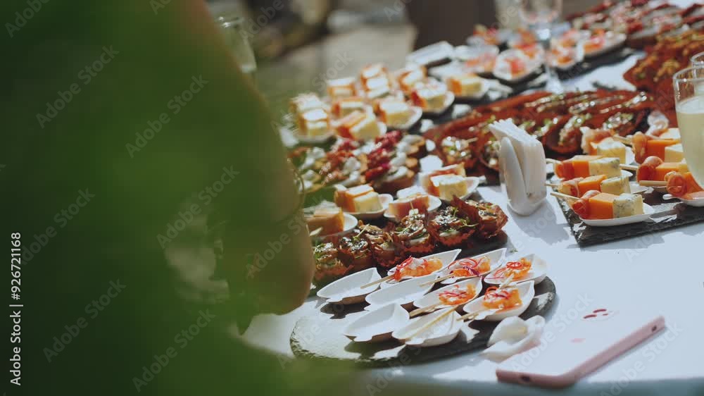 Buffet, buffet on the street, buffet at a banquet, buffet tables, snacks at a buffet, slow motion shooting Buffet, buffet on the street, buffet at a banquet, buffet tables, snacks at a buffet, slow motion shooting
